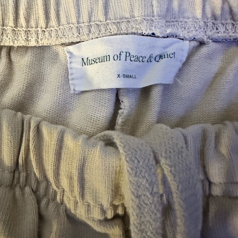 REVOLVE Warped Sweat Shorts Museum of Peace and Quiet
Tan SIZE XS - Picture 6 of 6